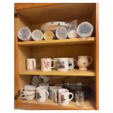 Mugs and dishes in cabinets A