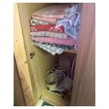 Rugs, baskets and decorative tchotchkes as shown