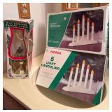 Two Noma candoliers and a Noma electric Christmas lamp