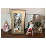 Three glass Santas