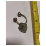 Keychain and charm marked Sterling, engraved Please return to Tiffany and Co. New York 025061