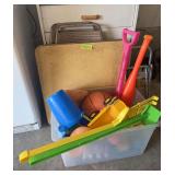 Tote of kids toys and child’s sized folding table