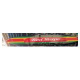 Red Stripe beer sign, surf board shaped 15 x 60