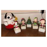 Snoopy and gang includes lite up figurines and rolling Snoopy