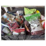 2 crates full of gardening fertilizer and rodent remover