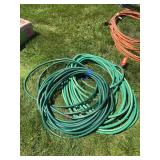 2 green garden hoses