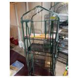 Four foot plastic covered green house and seedling heating mat