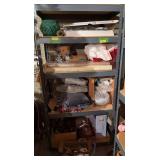 All on shelf includes tv wall mount, wrapping paper, decor, vases, etc