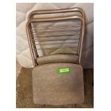 Two Cosco folding chairs