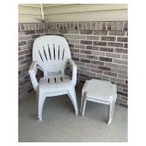 Two resin patio chairs w side tables