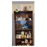 Top 5 shelves includes figurines, blue glass, stemware, cups & saucers, etc