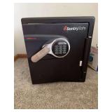 Sentry Safe w keypad lock Seller does not know combo, but safe is open w paperwork inside