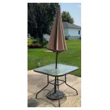 4’ square glass topped patio table w umbrella