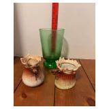 Two moose creamers, one looks to have been cracked but maybe not and green glass peony vase