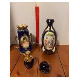 Blue decor includes vases, paper weight and perfume bottle