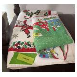 Two vintage Christmas tablecloths