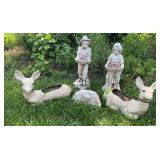 Two plastic deer planters, cement boy & girl, cement welcome stone