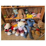 Two shelves of mostly stuffed bears including a really cute one made from OshKosh denim