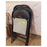 Three Samsonite folding chairs