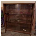 12D x 36L x 42H bookcase w sliding glass doors