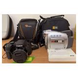 Canon SX530HS camera and Canon ZR60 camcorder
