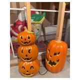 Two “carved” jack-o-lanterns, only one has a light