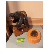 Carved bear figurine and “burned” bear paw print