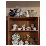 Top 3 shelves includes hand painted china, candle holders, bells, figurines and more