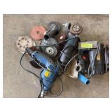 Grinder, sabersaw and drill