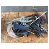 Assorted hand tools in bucket