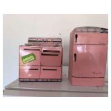 Mini Wolverine pressed metal fridge and stove, roughly 70 years old