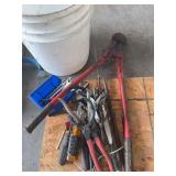 Assorted hand tools in bucket