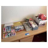 Assortment of embroidery floss, ribbon, and buttons