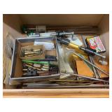 Three drawers of miscellaneous reloading equipment, targets, gun rack, etc.