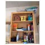 Shelf in garage - pesticides, bird house, garbage liners etc