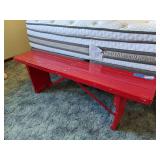 Red wooden bench that folds up 56 wide 17 tall