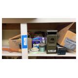 Miscellaneous fishing items, including pole repair supplies, saltwater fishing items, large quantities of fishing line, fillet knife