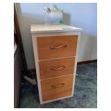 Three drawer vintage side table and vintage blue upholstered rocker