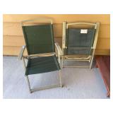 Two fold up metal frame outdoor chairs
