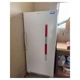 Frigidaire upright freezer in garage. See photo for model