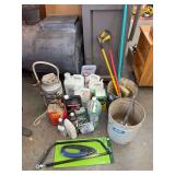 Assortment garden chemicals, bow and prune saws, small scrubber, garden sprayer