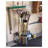 Long handle yard tools in holder rack