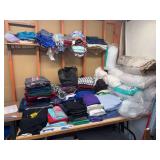 Large assortment of material fabric and batting