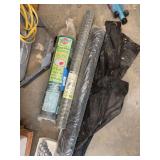 Chicken wire, plastic sheeting, and yard fabric