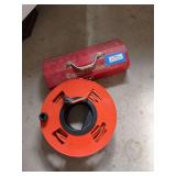 Cord and reel, coast to coast tool box with  tools in garage