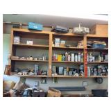 Shelf above tool bench, hardware, chemicals and all on workbench