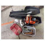 Echo 660EVL chainsaw, case, extra chains, oil, safty can with tools