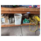 Bottom shelf work bench chemical, oil, rope, fence spikes, lag screws