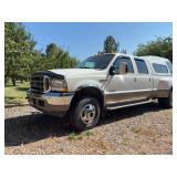 2003 ford f350 6 liter rebuilt with new head bolts and new piston (14,000 miles ago) King Ranch Edition power stroke v8 turbo diesel 139,231 miles, with extra tall topper, turnover b&w hitch, air bags