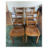 Four matching solid wood ladder back chairs